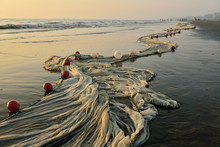 The Very Long Fishing Net Lying On The Longest Beach, Cox's Bazar In Bangladesh.