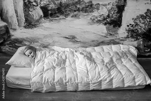 Mannequin Head Of Beautiful Blonde Long Haired Female Lying On Bed