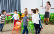 © JackF - Kids and teacher playing musical chairs