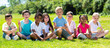 © JackF - Portrait of children who are posing lying in the park