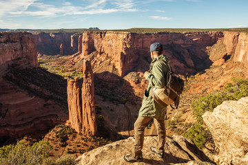 Wall Mural - a hiker in the canyon de chelly national monument