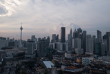 Fototapeta Miasto - Aerial drone view of Kuala Lumpur city skyline during cloudy day