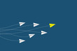 Leadership and competition concept, with yellow paper plane leading among white.