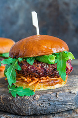 Canvas Print - Vegetarian beetroot burger with avocado and carrot slaw in brioche bun