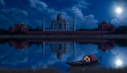 Fototapete - Taj Mahal Agra on a full moon night as seen from Mehtab Bagh on the banks of river Yamuna. Taj Mahal is a UNESCO World Heritage site and a Mughal architecture masterpiece
