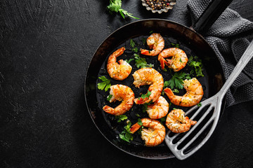 Sticker - Grilled shrimps on pan on dark background