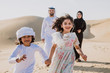 © oneinchpunch - Arabian family spending a weekend in the desert, in Dubai