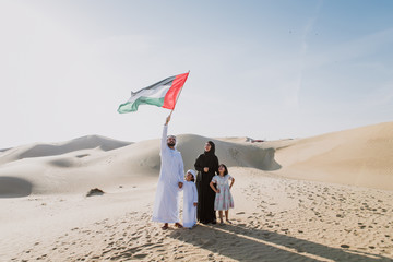 Wall Mural - Arabian family spending a weekend in the desert, in Dubai