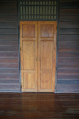 Canvas Print - old wooden door in the wall