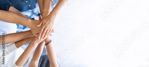 Fotomural Stack of hands. Unity and teamwork concept.