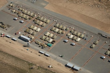 Overhead aerial shot of a military base in the rocky mountains