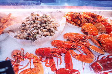 Wall Mural - fresh seafood prawns and crawfish and lobsters for sale at the market. Healthy mediterranean delicacy concept.