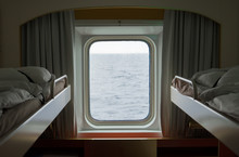 View Of The Sea Storm From The Porthole Of The Ship.