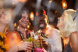 © Seventyfour - Multi-ethnic group of adult friends wearing Halloween costumes drinking cocktails while enjoying party in club and having fun