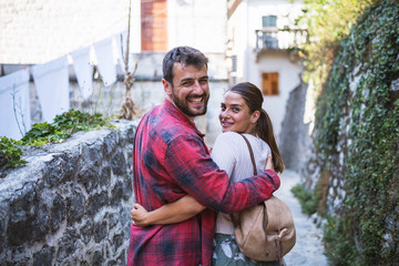 Wall Mural - Tourist couple on a vacation,exploring town