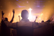 © paul - Worship concept: Christians raising  hands in praise and worship night