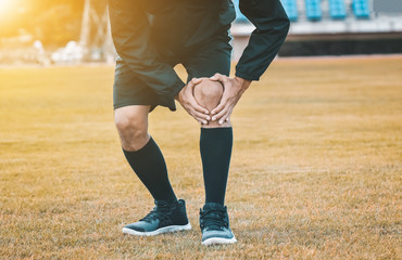 Wall Mural - Runner man are Knee pain when Running on Jogging