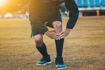 Wall Mural - Runner man are Knee pain when Running on Jogging