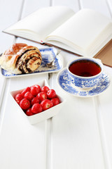 Sticker - Poppy seed swedish bun and bowl of strawberries.