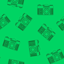 Decorative Print With Camera On Green Backdrop. Seamless Pattern With Randomly Arranged Line-drawn Cameras.