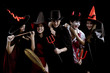 © P Stock - Group young Asian in costume Halloween party on black background.