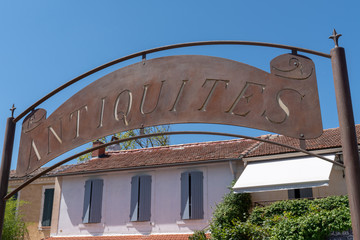 Wall Mural - french Antiquites means Antiquity shop sign in isle sur la sorgue France