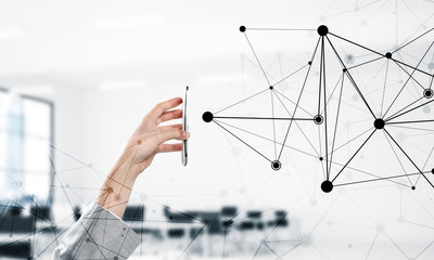 Business and technology concept with networking grid and man using device