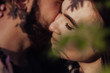 © Марина - Head shot of young affectionate romantic couple in love. Close up portrait of attractive brunette girl and guy with eyes closed, close to each other. Concept of first kiss, tenderness and amorousness.