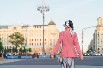 Attractive girl walking in summer