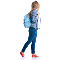 Woman in casual clothing student with backpack looking smiling goes walking on white background isolation