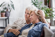 © ReeldealHD images - Mature lesbian couple at home on sofa