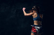© Fxquadro - Beautiful sportive woman is warming up before training while posing for photographer.