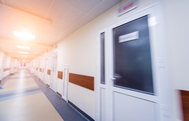 Wall Mural - Empty long corridor in the modern clinic.