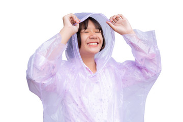 Cute Asian girl in raincoat on the white background. The rainy season concept.