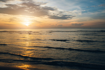 Wall Mural - Colorful ocean beach sunrise.