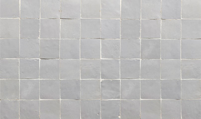 Wall Mural - Old grey ceramic tile texture background. Grey square tiled wall.