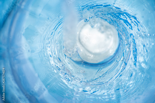 Cuadros en Lienzo Flowing stream of blue clear liquid