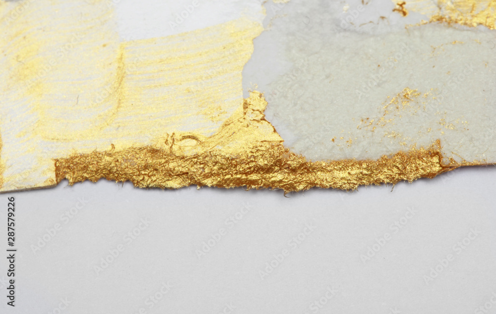 Torn piece of edge paper on white background. Gold and bronze color marble texture. - obrazy, fototapety, plakaty 