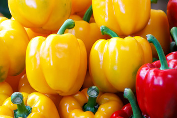 Wall Mural - Fresh yellow and red sweet bell pepper background