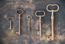Escape Room Concept, Group Of Antique Keys On Rusty Metal Background