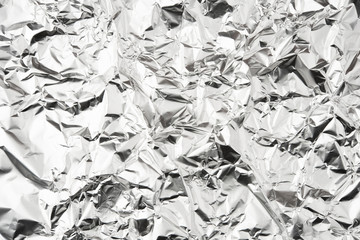 Foil silver crumpled metal aluminum texture background surface decoration backdrop design photo hi resolution