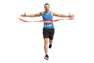 Canvas Print - Happy young man finishing a marathon race on the finish line