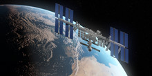 3d Rendered Illustration Of The ISS Infront Of The Earth