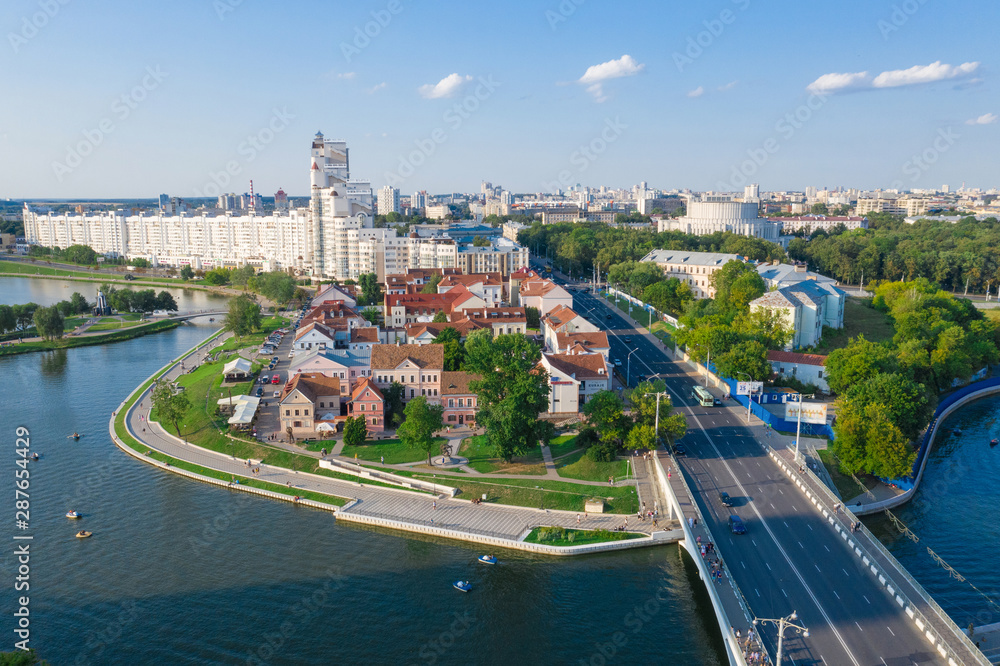 Obraz na płótnie MINSK, BELARUS - JULY 2019: Aerial View, Cityscape Of Minsk, Belarus. Summer Season, Sunset Time. Panorama Of Nemiga District w salonie