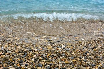 Pebble shore of French Riviera in Nice, natural background