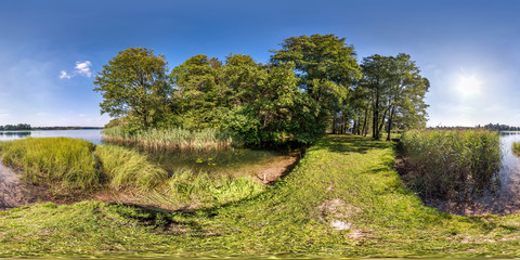 Wall Mural - seamless spherical hdri panorama 360 degrees angle view on grass coast of huge river or lake in sunny summer day and windy weather in equirectangular projection with zenith and nadir, VR AR content