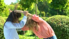 Two Young Women Fighting Pulling Hairs Of Each Other, Female Conflict, Quarrel