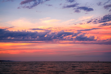 Wall Mural - Beautiful sunset clouds over Lake Superior