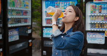 Woman Bought A Bottle Of Juice On Vending Machine