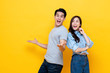 © Atstock Productions - Attractive happy amazed young Asian couple